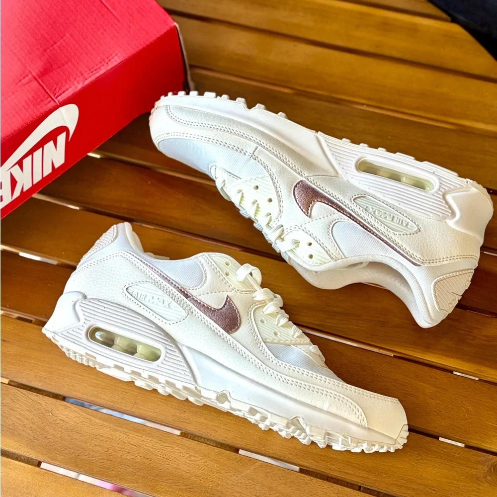 Nike Women's Sneaker in Cream with Pale Pink Swoosh